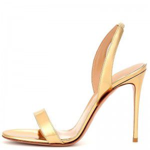 Fashionable and elegant gold and black toe baring high-heeled sandals with exposed heels